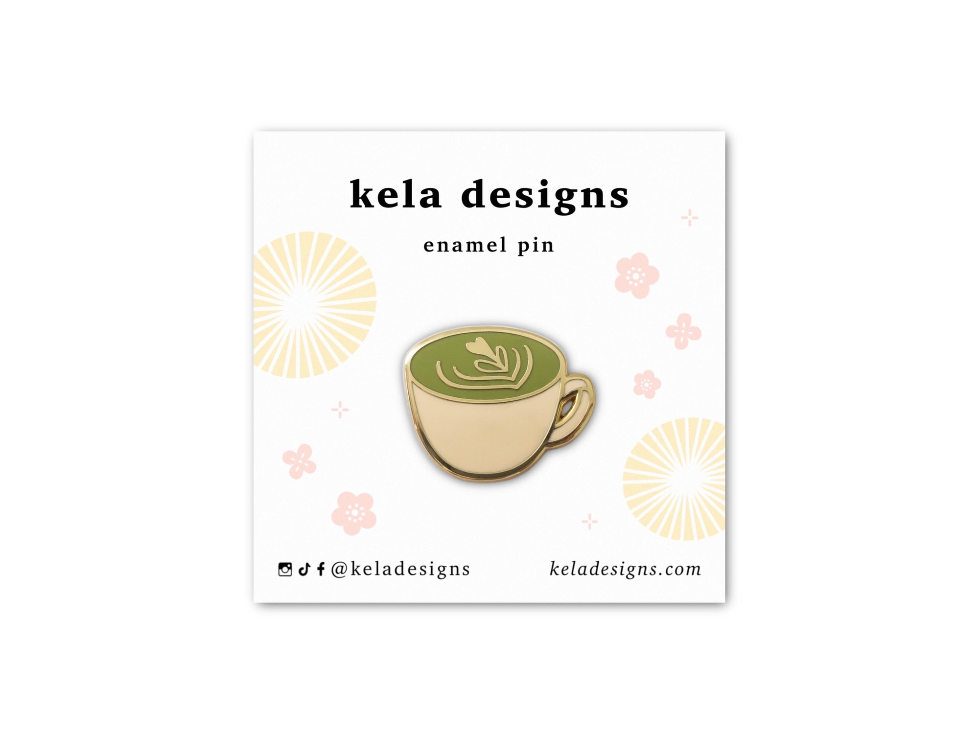 Enamel pin of a green tea cup on a kela designs card with branding details.