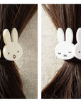 Miffy hair tie shown on brown hair