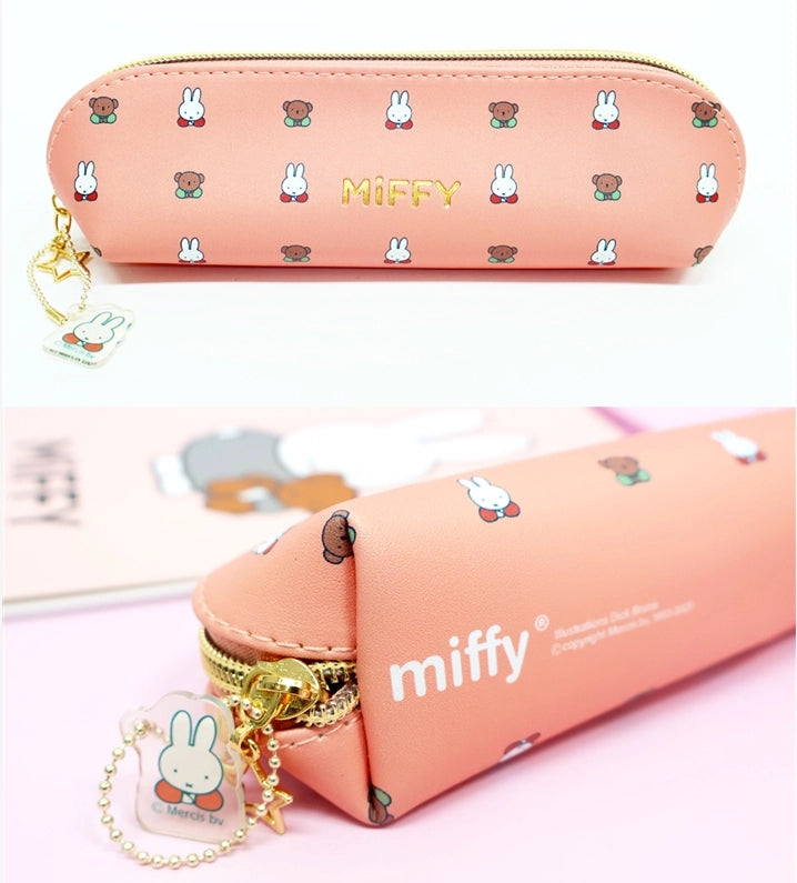two different angle photos of a peach pencil pouch, with bunny miffy and bear boris pattern
