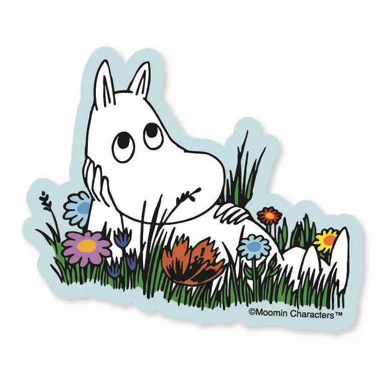 Sticker featuring Moomin character laying in a floral field, with blue outline background