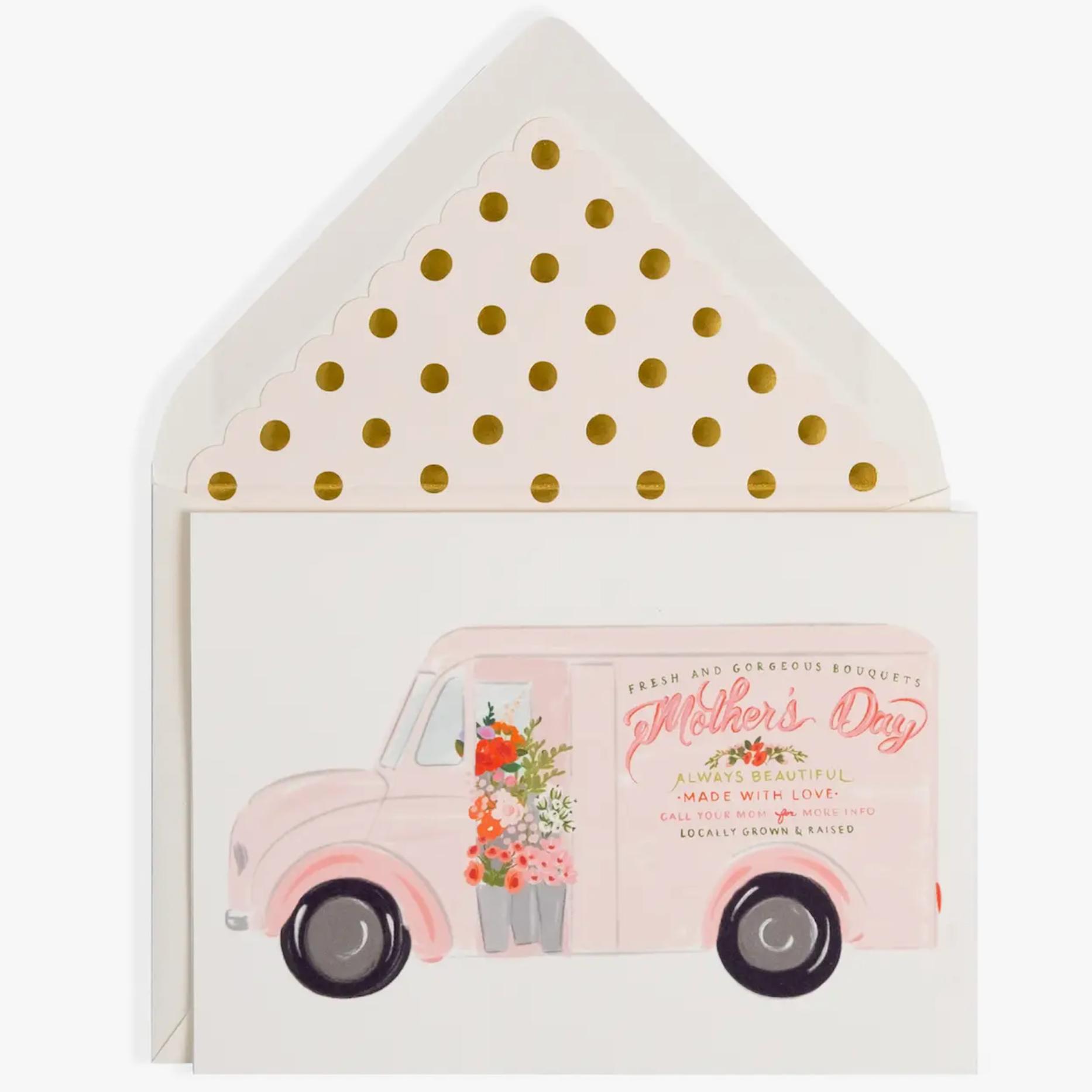 A greeting card with a pink delivery truck design, featuring polka dots and flowers, with a blank inside for a personal message, and a matching envelope.