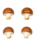 Four mushroom-shaped objects on a white background