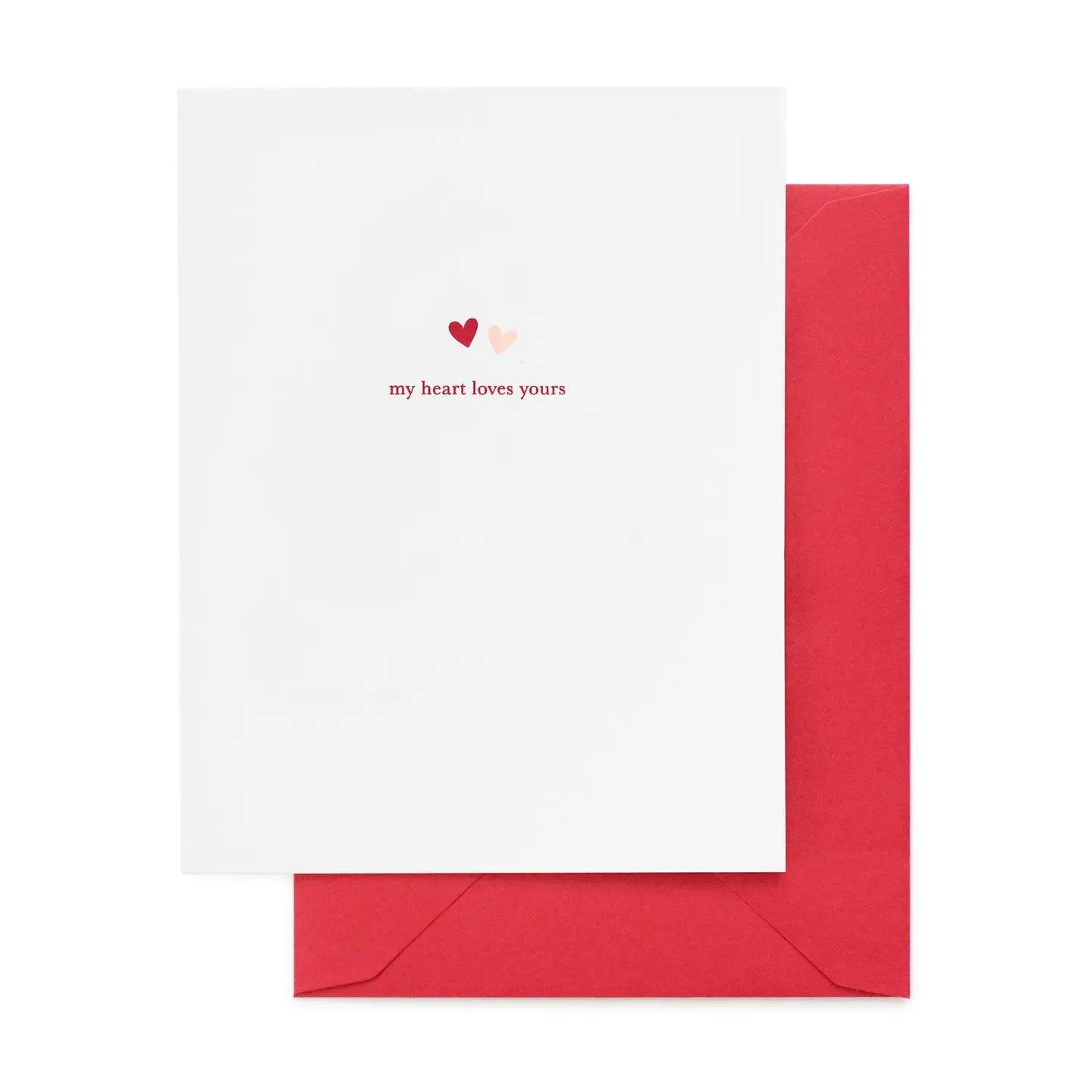 White card with red and pink hearts and 'my heart loves yours' text, paired with a red envelope on a white background.
