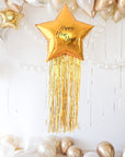 fringed gold star balloon