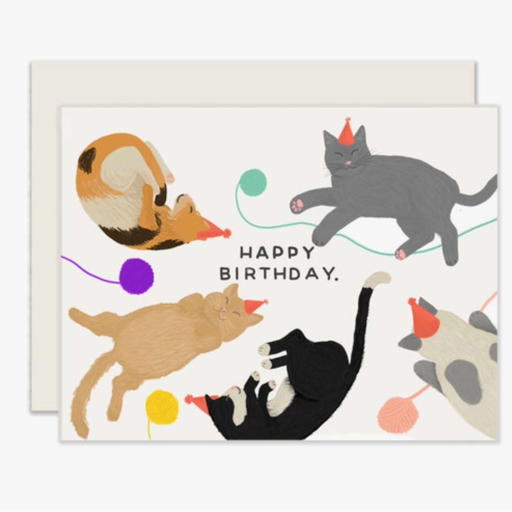 A folded birthday card with a colorful illustration of various cats in a birthday-themed design, including a card with 'Happy Birthday' text.