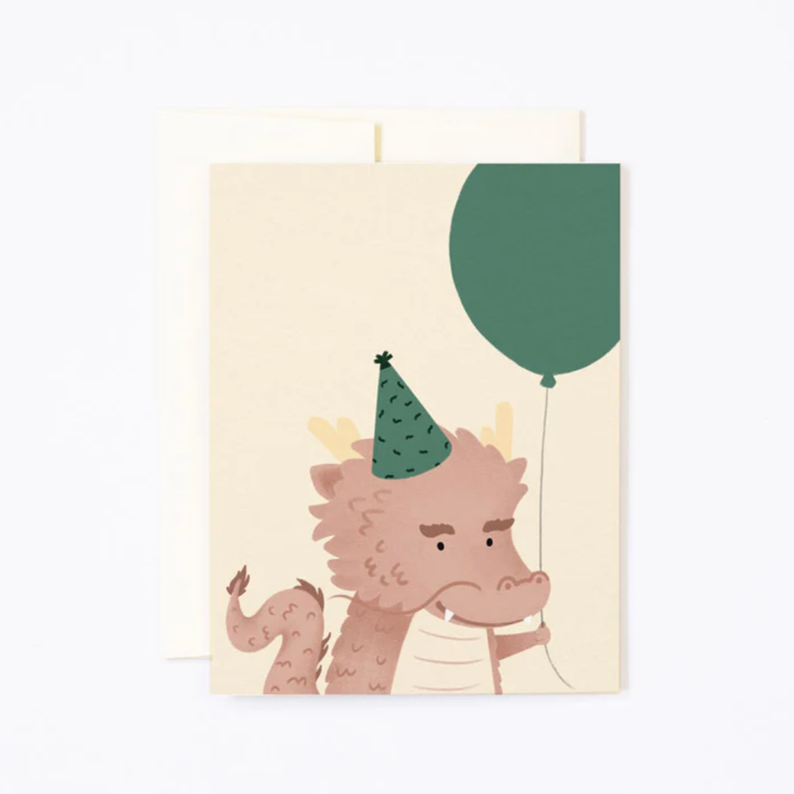 Greeting card with an illustration of a cartoon dragon wearing a party hat and holding a balloon, with a blank space for a message and a matching envelope.