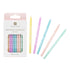 Pastel-colored birthday candles with printed text 'Happy Birthday' on a white background