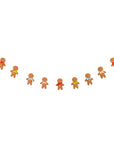 Decorative garland strung with gingerbread men figures on a white background