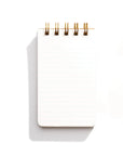A white lined note book with  ring binding.
