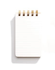 A linted note book with ring binding