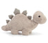 A plush toy resembling a gray Stegosaurus dinosaur with spiky accents
