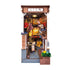 Miniature model of a Japanese street scene with a shop entrance.