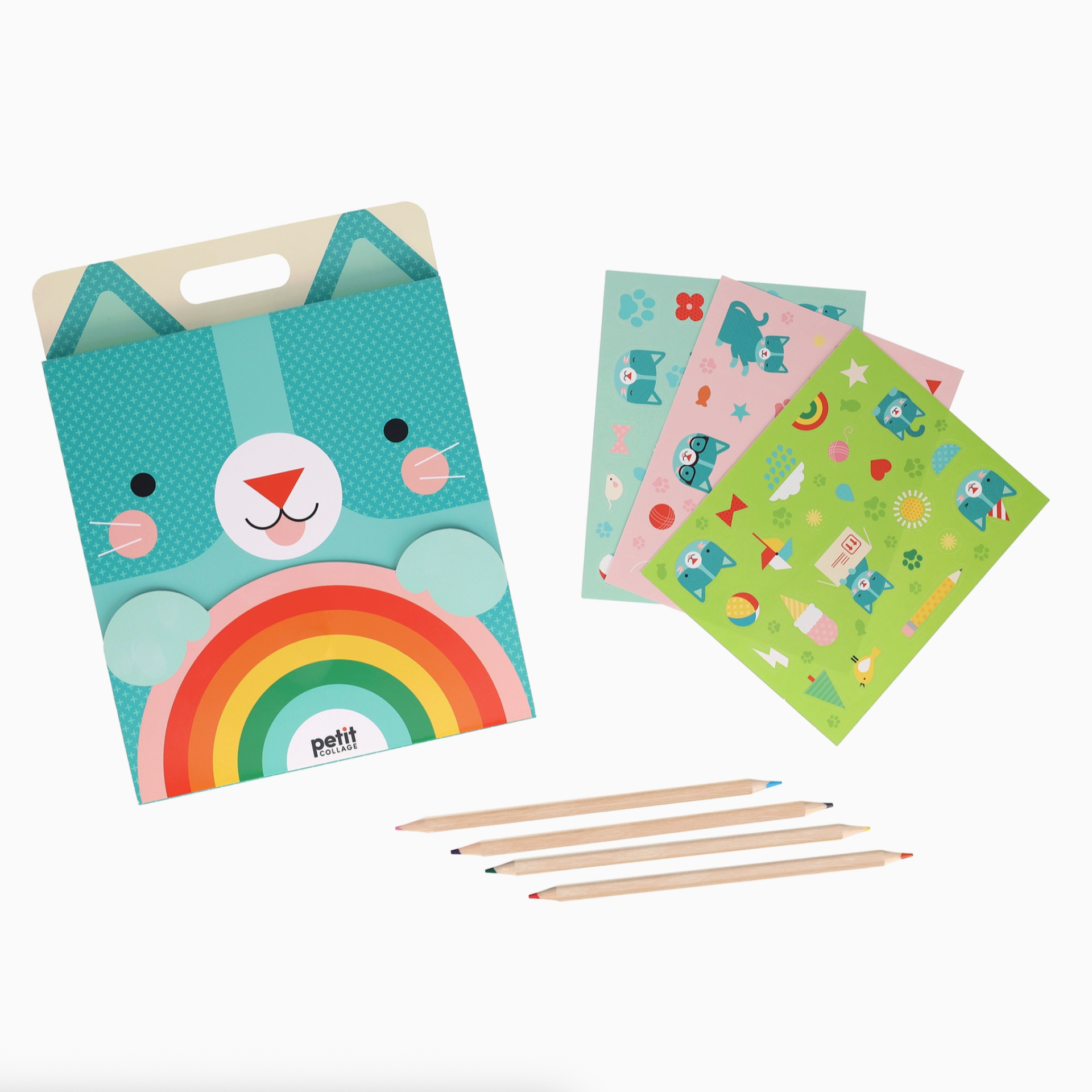 Children's sketchbook set with a cartoon kitten design, colored pencils, and patterned paper on a white background.