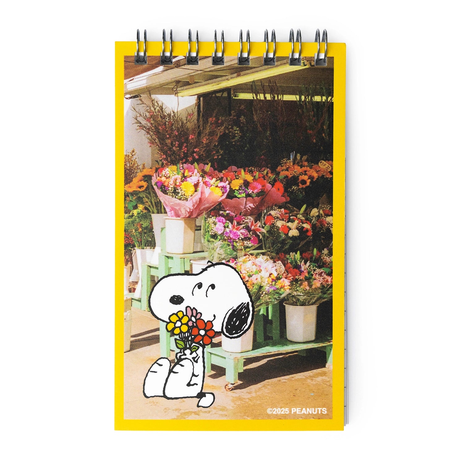 Notebook cover with Snoopy holding flowers and a flower shop in the background