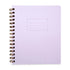 A lilac-colored notebook with a wire-o binding and a purple name, date, and subject line on the cover.