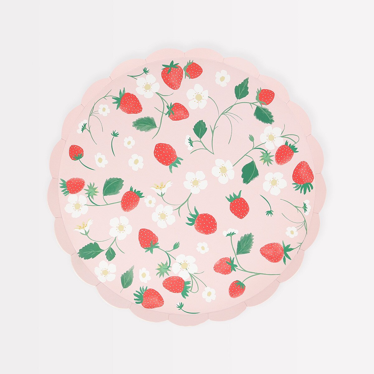 Round pink mat with strawberry pattern on a white background