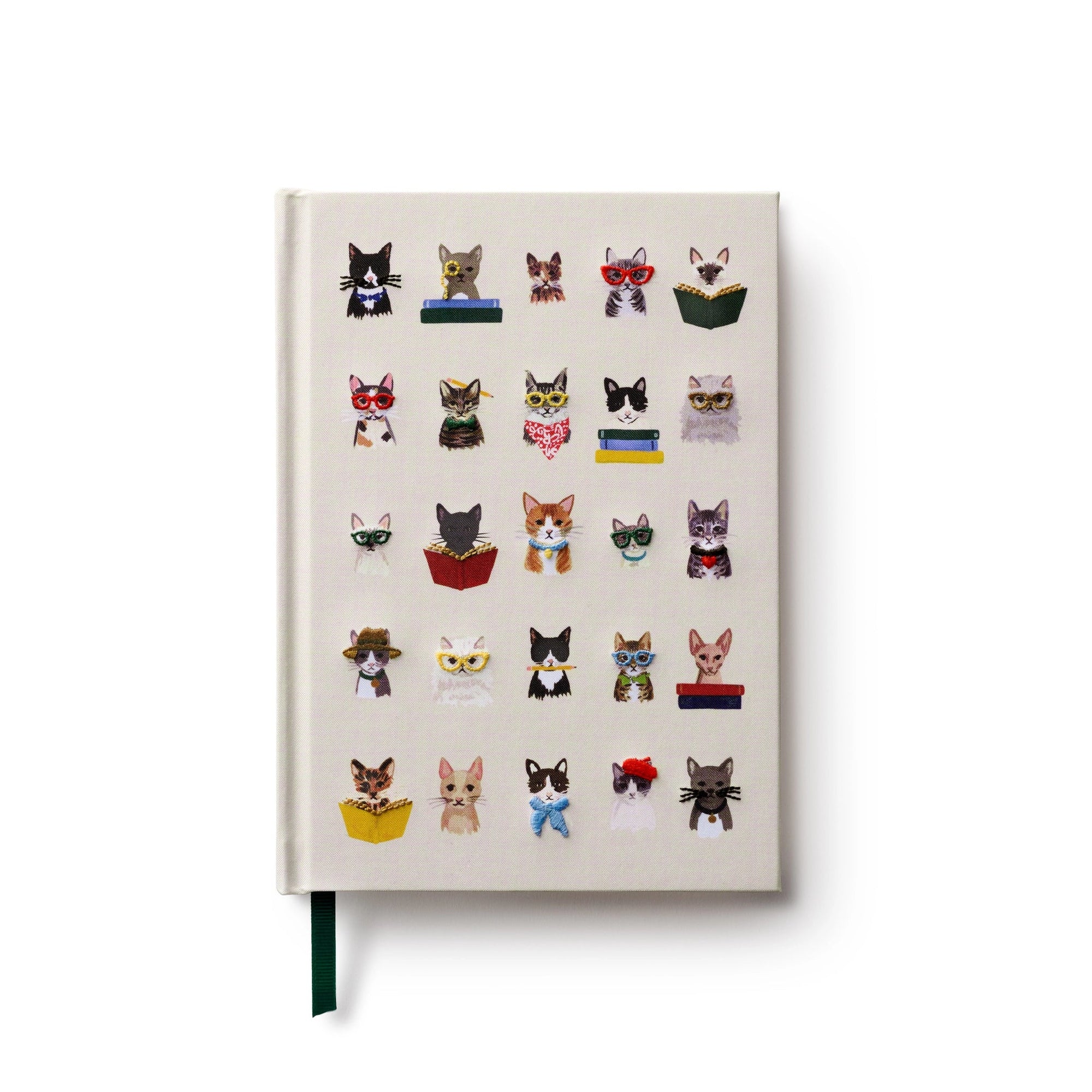 A beige notebook with cat in various oufits on the cover