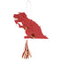 A piñata shaped like a T-Rex with red body, brown spots, and a copper foil detail on its back, with a string of confetti and two temporary tattoos attached.