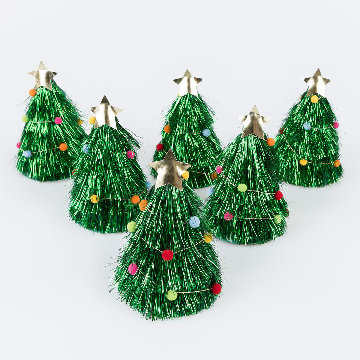 Set of 6 green tinsel Christmas tree hats with star toppers on a white background
