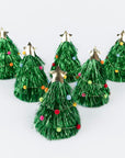 Set of 6 green tinsel Christmas tree hats with star toppers on a white background