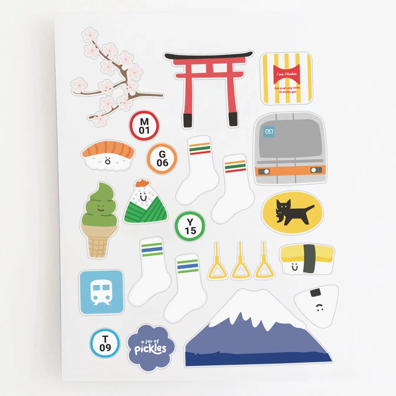 A sheet of cute, cartoon-style Japanese-themed stickers on a white background. The stickers feature illustrations of Mount Fuji, a red torii gate, pink cherry blossoms, sushi, ice cream, socks, a train, and a black cat.