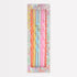 Pack of colorful birthday candles in a decorative box with 'Liberty' branding.