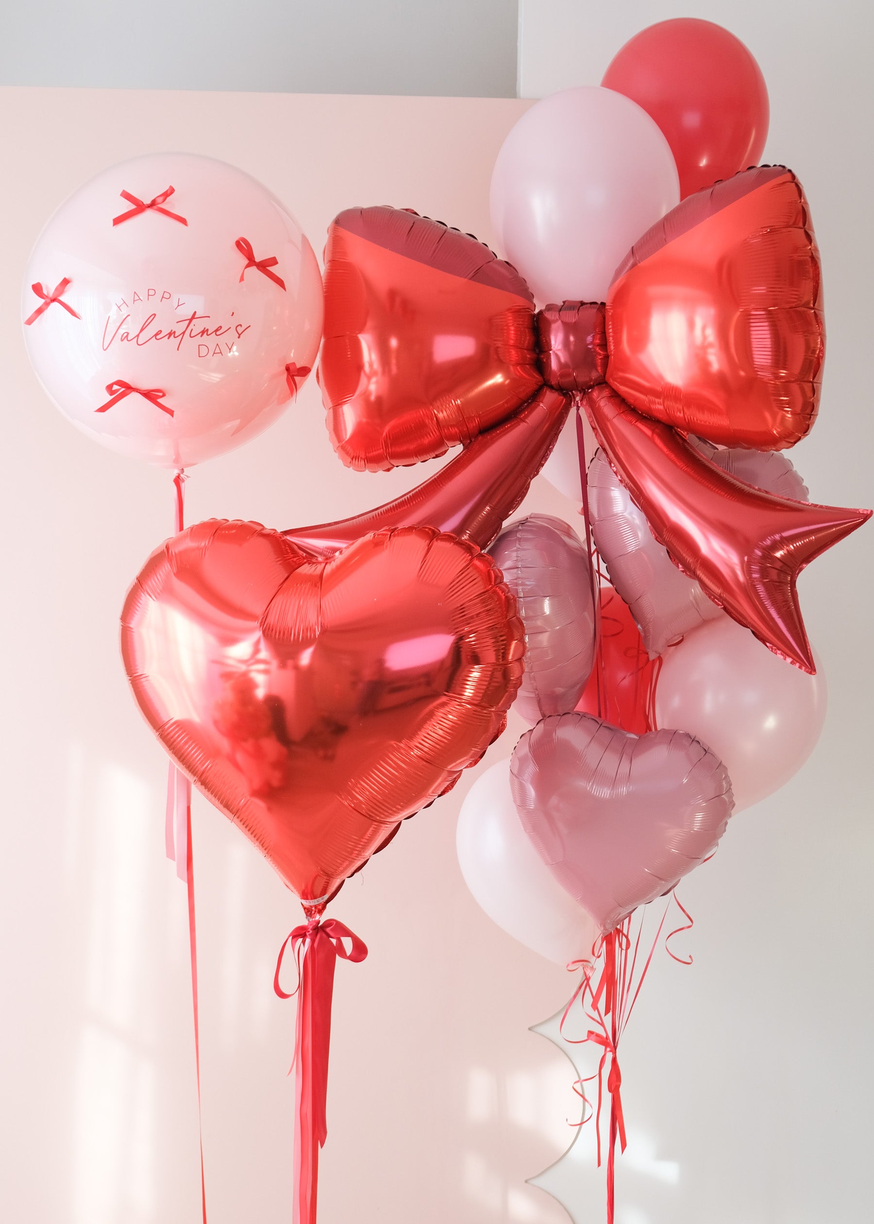 valentine's day balloon three piece set with bows and hearts