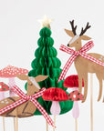 A set of christmas themed woodland cake toppers include mushrooms, deers and a honeycomb green tree.