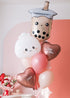 A balloon bouquet featuring a boba bubble tea character balloon, a dumpling with a heart face balloon, and a variety of other balloons in pink, red, and white colors with 'love you' and 'xoxo' decals.