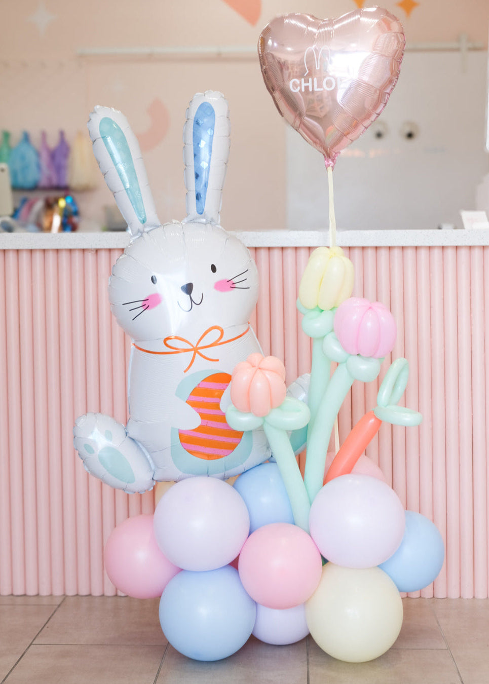 easter bunny balloon arrangement with balloon tulips