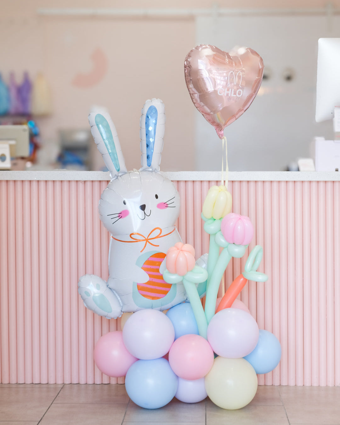 easter bunny balloon arrangement with balloon tulips