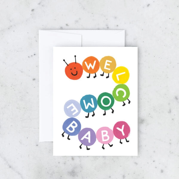 A colorful baby-themed card with a caterpillar design and the text 'WELL WOW BABY' in a circular pattern, paired with a matching envelope.