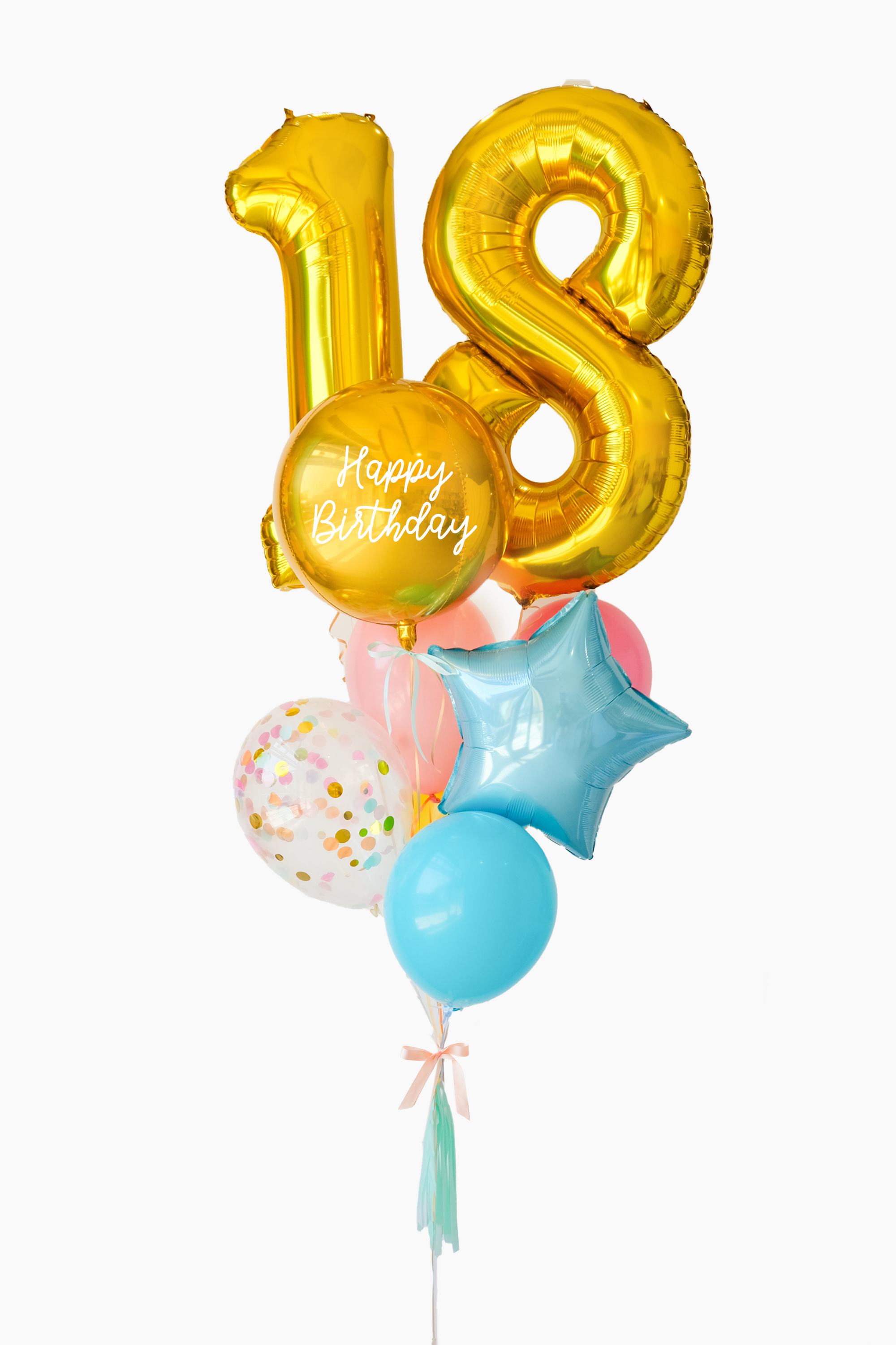 A balloon arrangement with a gold '18' birthday balloon, multicolored balloons, and additional birthday-themed decorations.