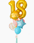 A balloon arrangement with a gold '18' birthday balloon, multicolored balloons, and additional birthday-themed decorations.