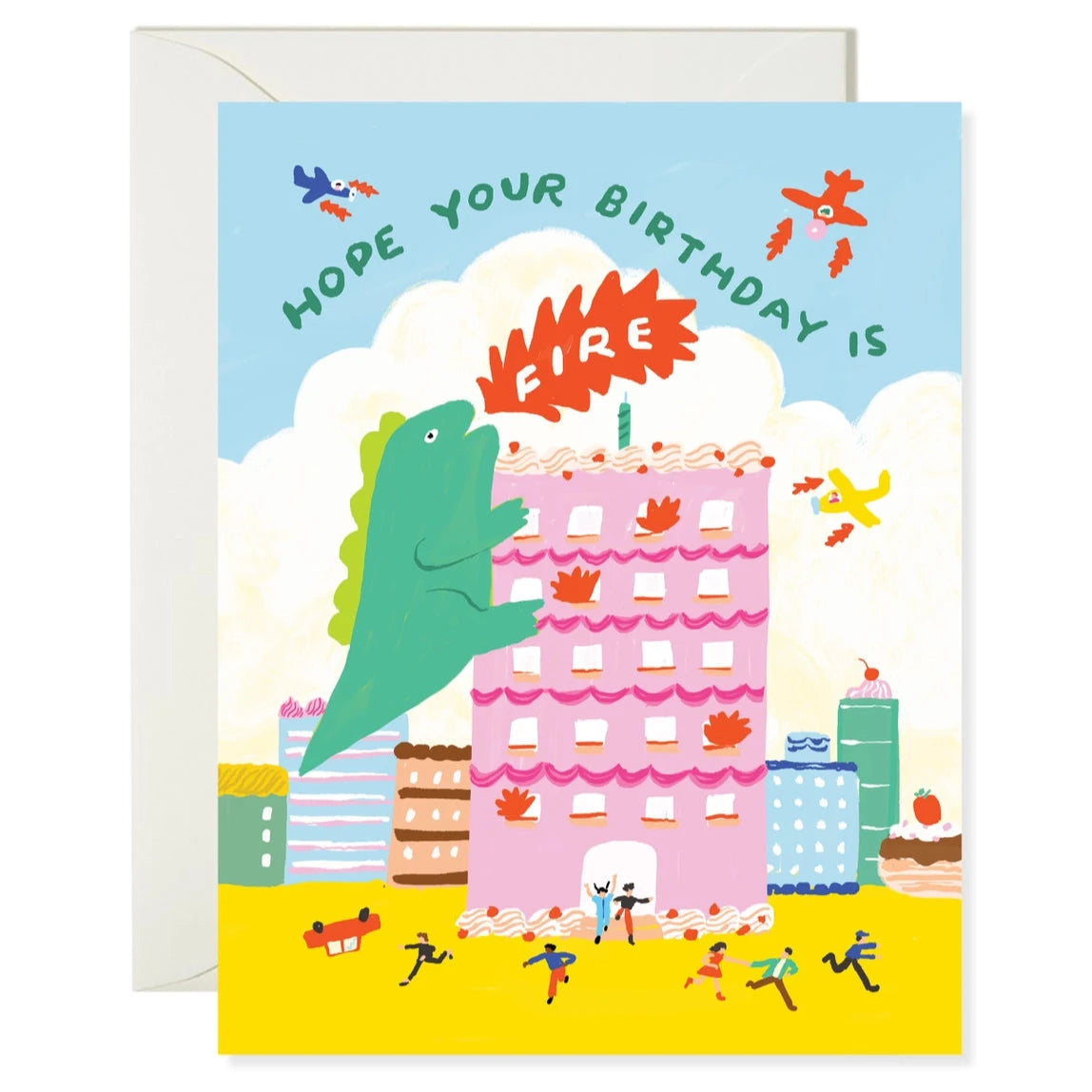 Greeting card with an illustration of Godzilla blowing out a birthday candle on a building, with a cityscape background and several small creatures around.
