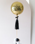 custom grad balloon with bow and tassel