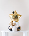 star balloon centerpiece with "congrats grad"