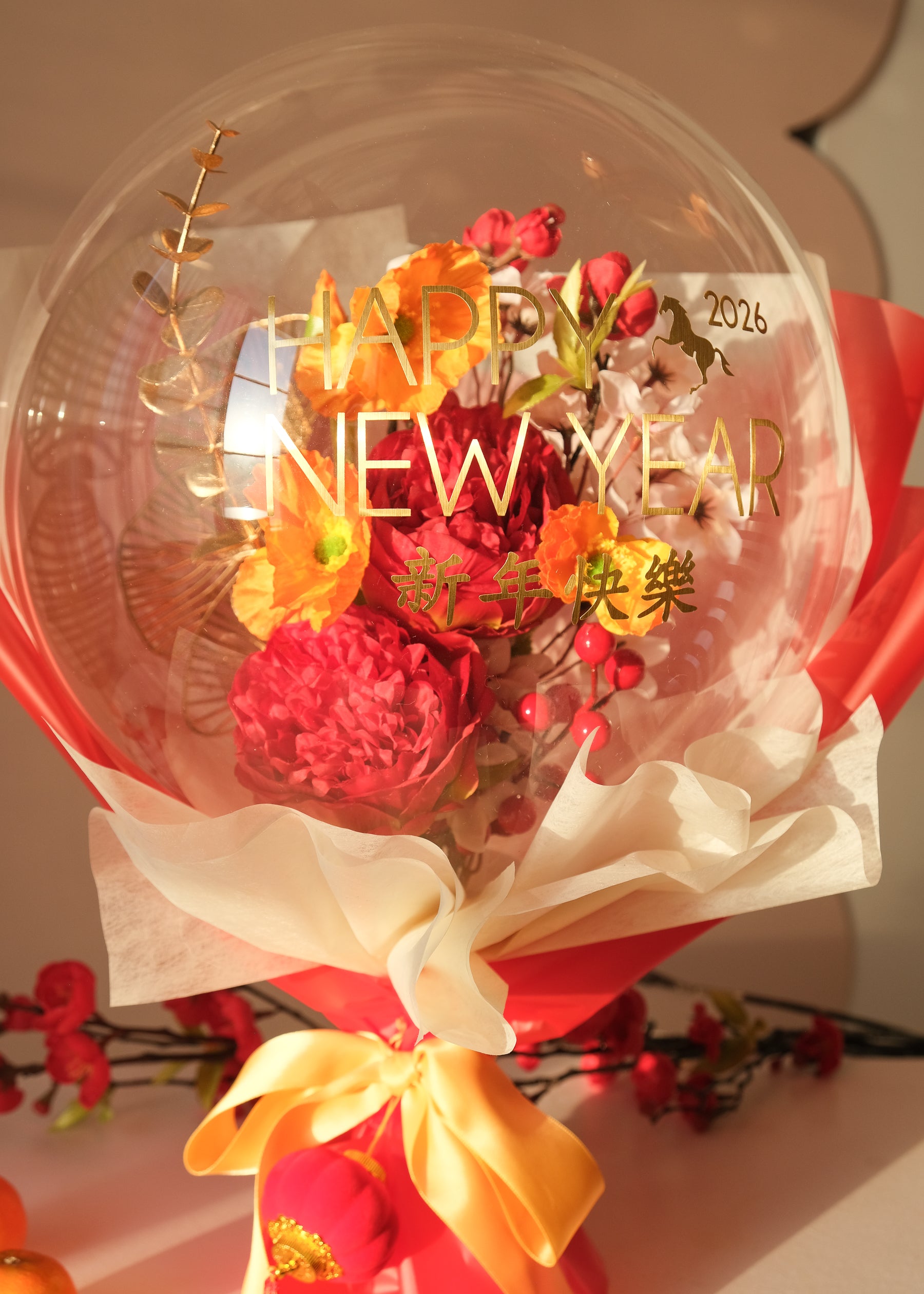 Lunar new year themed florals inside a balloon, close up 