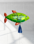 A large green fish with 'You-O-Fish-ally The Best Dad' printed on it.