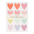 A pack of pastel glitter heart stickers with various shades of pink, orange, yellow, green, and purple, packaged in a clear plastic bag with a white and pink label.