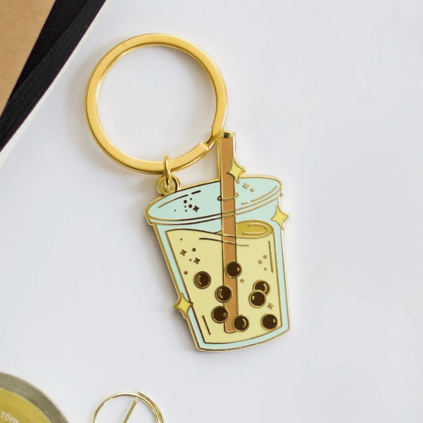 boba keychain with gold accents
