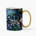 A navy-colored ceramic mug with a gold rim and handle, featuring a full-color illustration of peacocks and branches.
