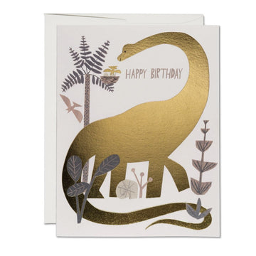 dinosaur birthday card in gold foil by christian robinson for red cap cards