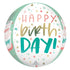 A round balloon with a 'Happy Birthday' text design in mint and coral colors, adorned with stars and dots pattern.