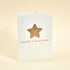A white greeting card with a gold star design and the text 'You get a GOLD STAR!' on the front, paired with a mint envelope with a square flap.